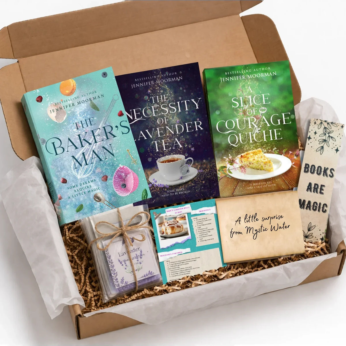 Mystic Water Cozy Story Box with three Mystic Water novels, tea, a recipe card and a bookmark